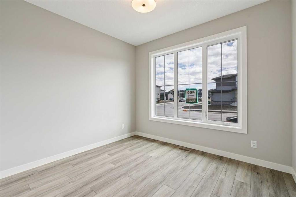 400 Fireside Drive, Cochrane, AB - Indoor Photo Showing Other Room