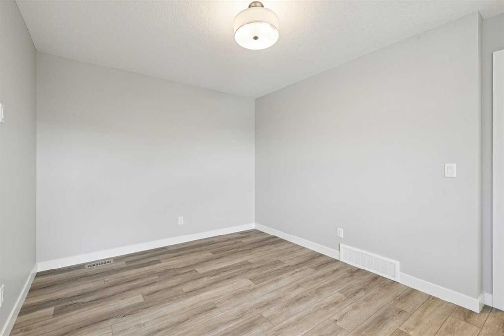 400 Fireside Drive, Cochrane, AB - Indoor Photo Showing Other Room