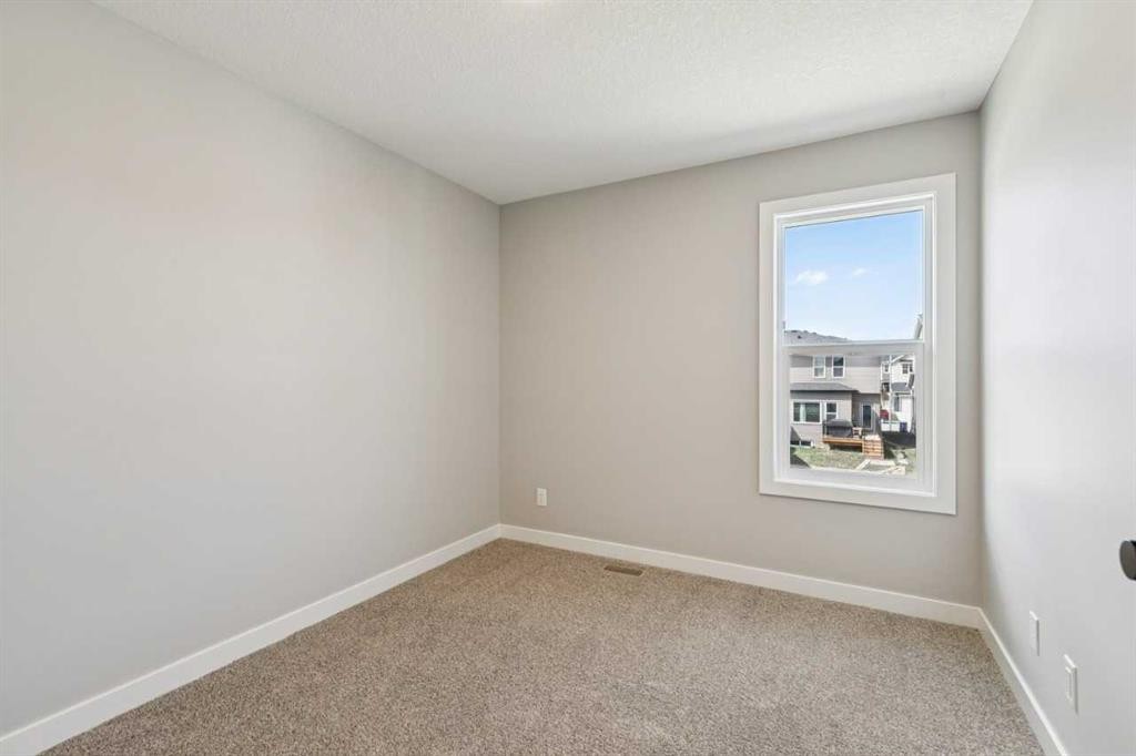 400 Fireside Drive, Cochrane, AB - Indoor Photo Showing Other Room