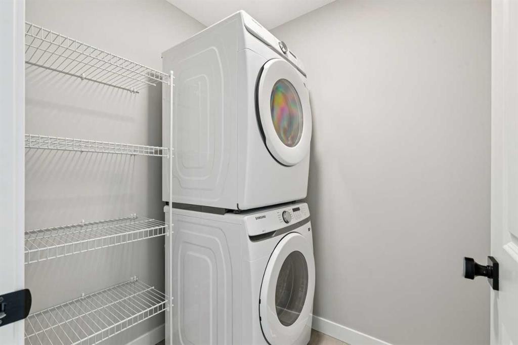 400 Fireside Drive, Cochrane, AB - Indoor Photo Showing Laundry Room