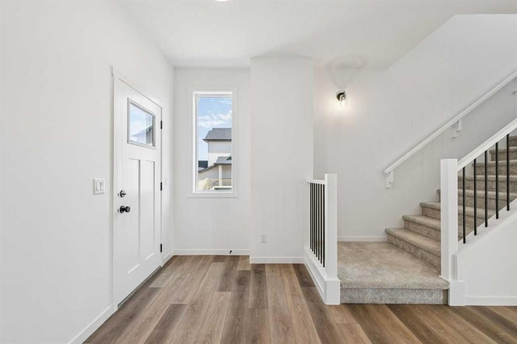 156 Southborough Common, Cochrane, AB - Indoor Photo Showing Other Room