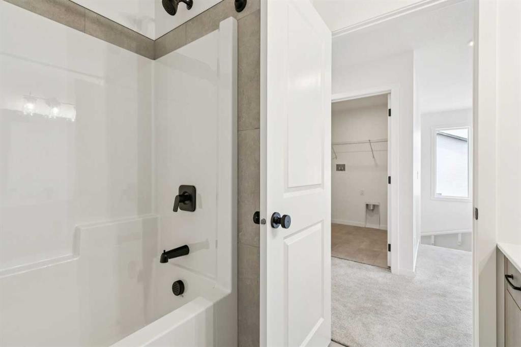 156 Southborough Common, Cochrane, AB - Indoor Photo Showing Bathroom