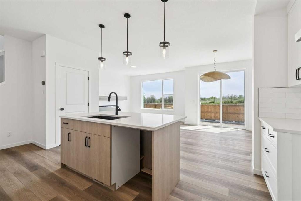 156 Southborough Common, Cochrane, AB - Indoor Photo Showing Kitchen