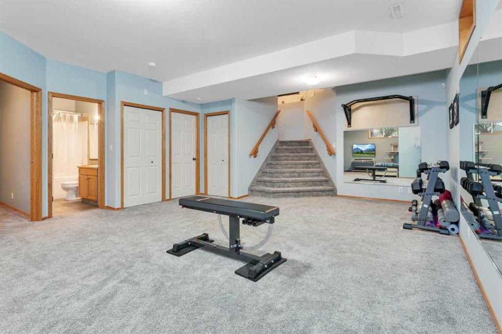 35 Lang Close, Red Deer, AB - Indoor Photo Showing Gym Room