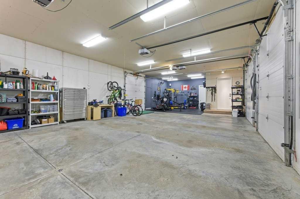 305 Jarvis Glen Court, Jarvis Bay, AB - Indoor Photo Showing Garage