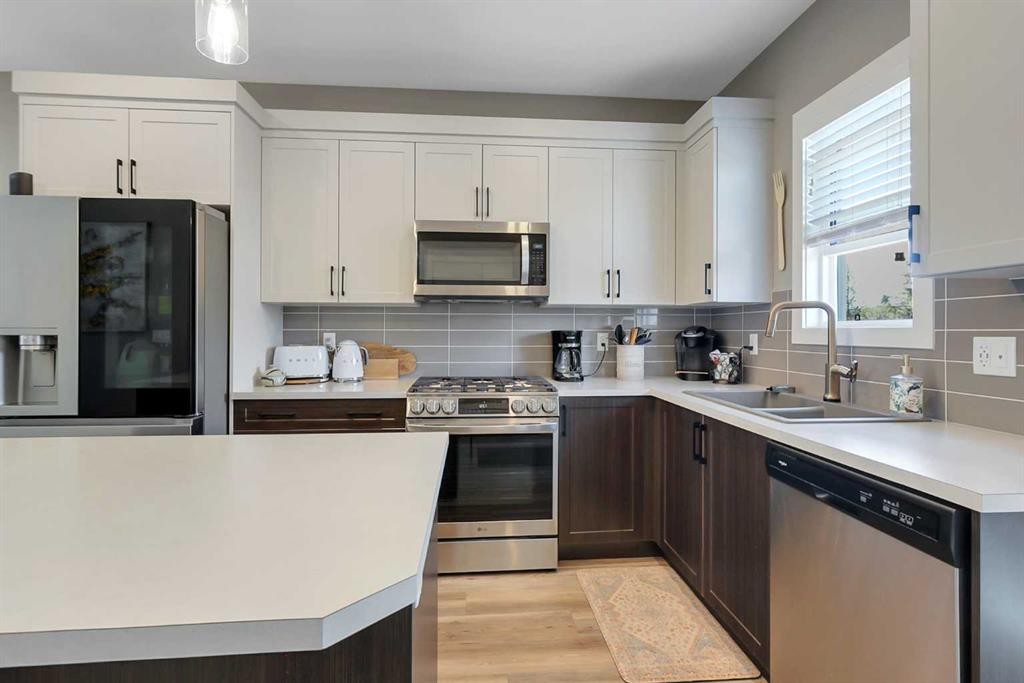 68 Windermere Close, Red Deer, AB - Indoor Photo Showing Kitchen With Double Sink