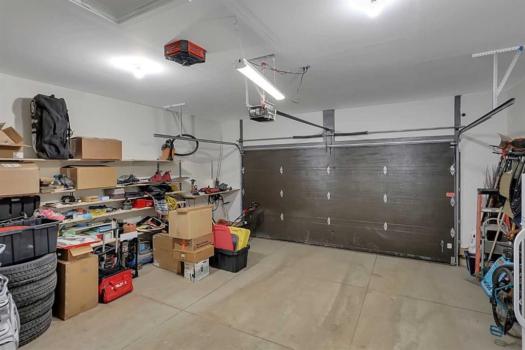 68 Windermere Close, Red Deer, AB - Indoor Photo Showing Garage