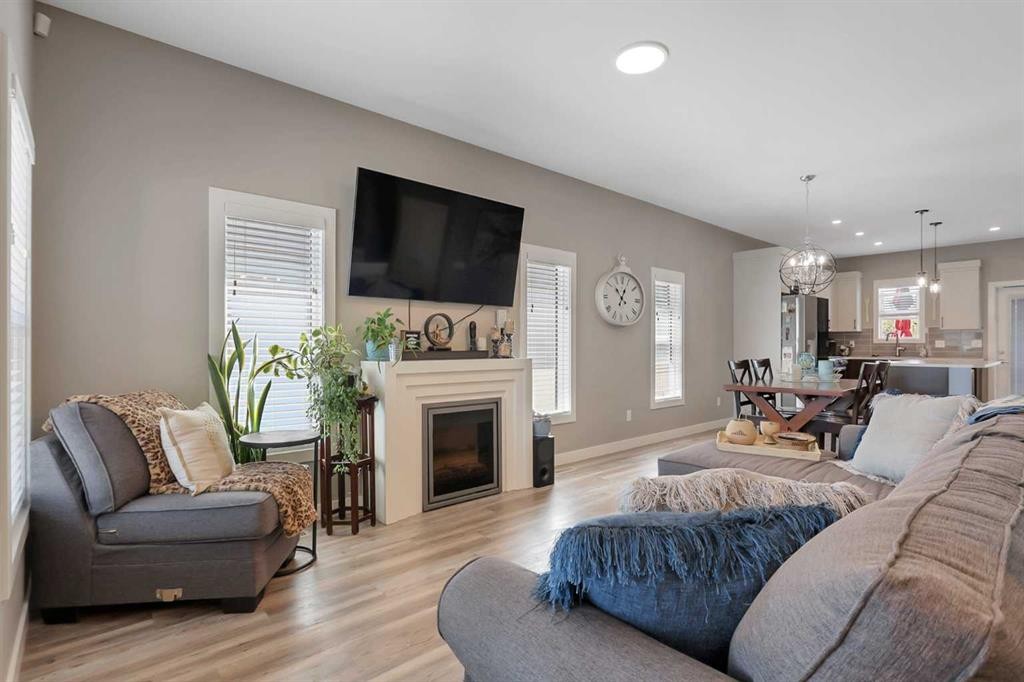 68 Windermere Close, Red Deer, AB - Indoor Photo Showing Living Room With Fireplace