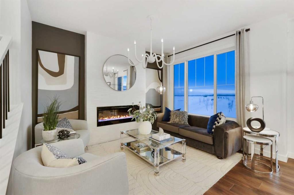 206 Sora Way Se, Calgary, AB - Indoor Photo Showing Living Room With Fireplace