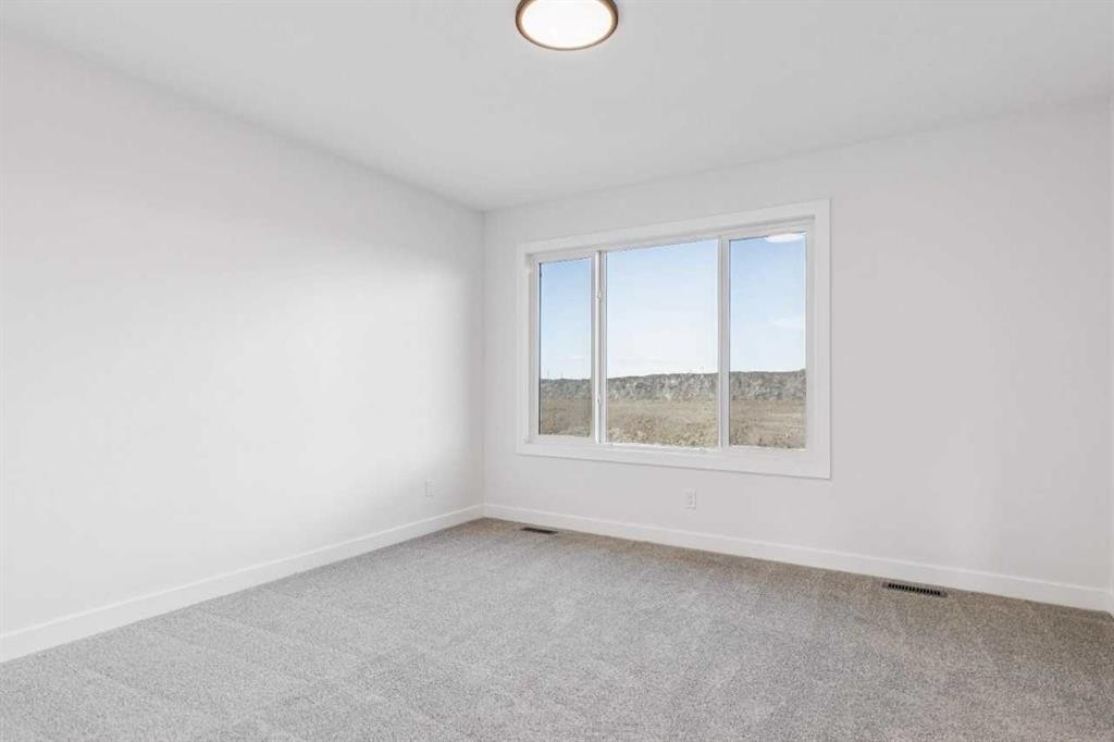 206 Sora Way Se, Calgary, AB - Indoor Photo Showing Other Room