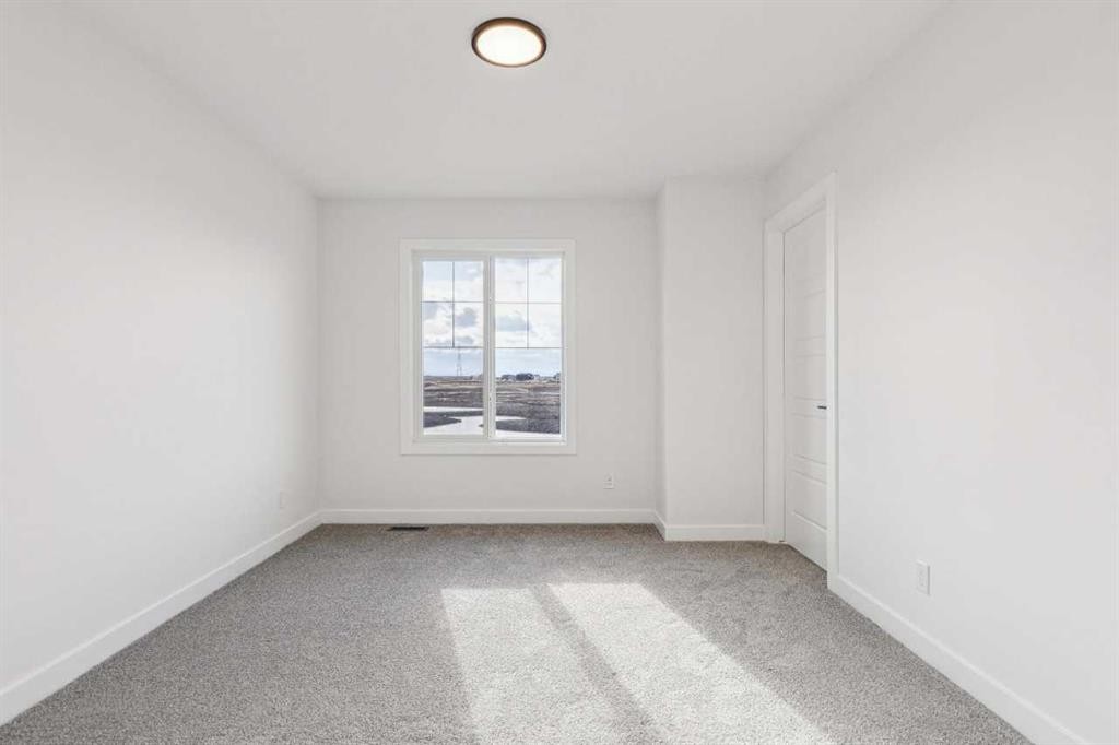 206 Sora Way Se, Calgary, AB - Indoor Photo Showing Other Room