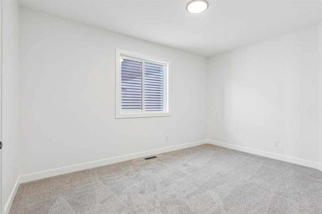 206 Sora Way Se, Calgary, AB - Indoor Photo Showing Other Room