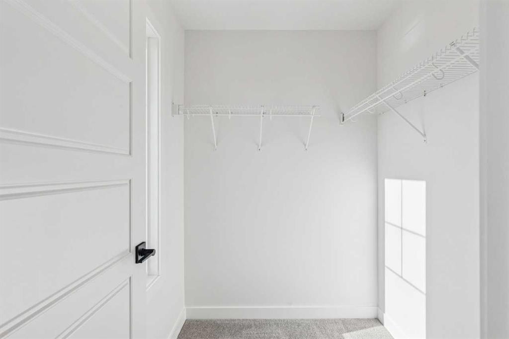 206 Sora Way Se, Calgary, AB - Indoor With Storage
