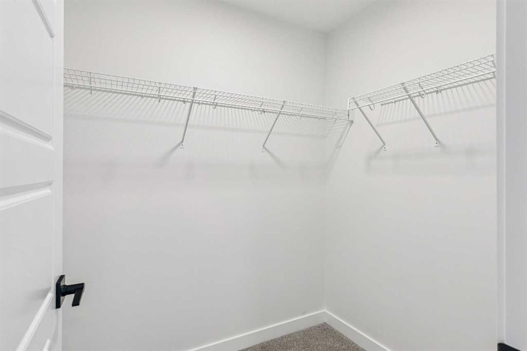 206 Sora Way Se, Calgary, AB - Indoor With Storage