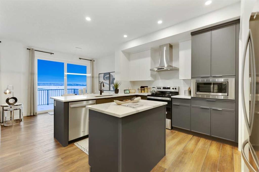 206 Sora Way Se, Calgary, AB - Indoor Photo Showing Kitchen With Stainless Steel Kitchen With Upgraded Kitchen