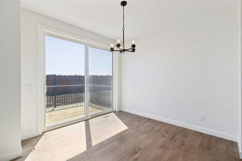 65 Sora Gardens Se, Calgary, AB - Indoor Photo Showing Other Room