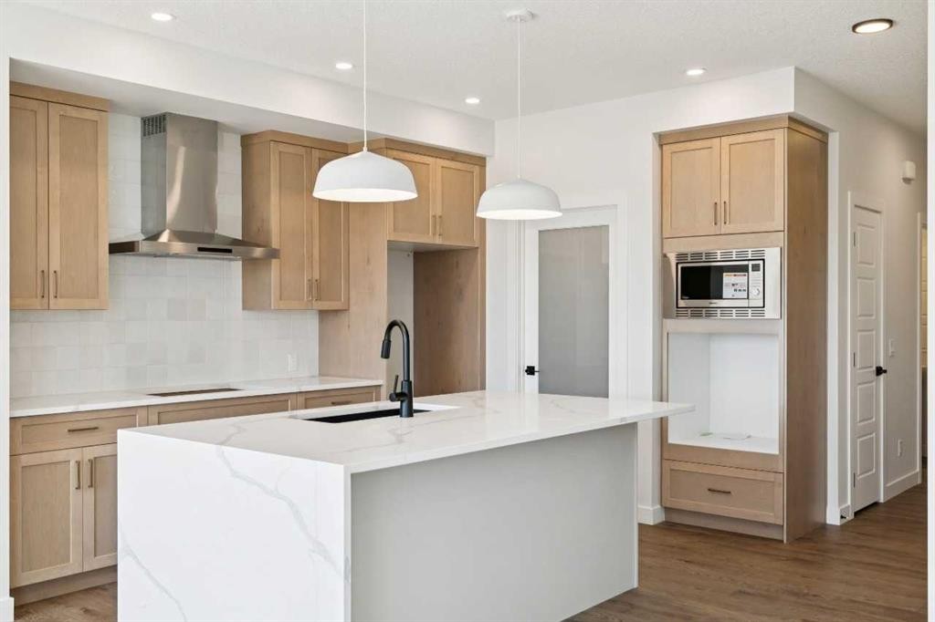 65 Sora Gardens Se, Calgary, AB - Indoor Photo Showing Kitchen With Upgraded Kitchen