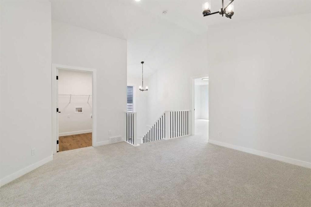 65 Sora Gardens Se, Calgary, AB - Indoor Photo Showing Other Room
