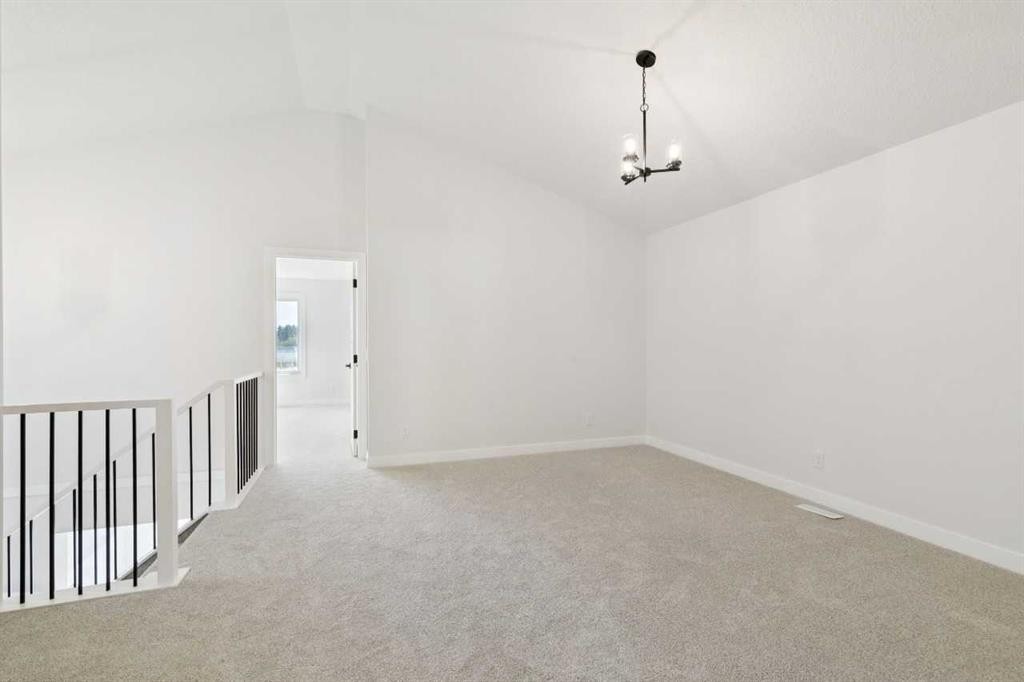 65 Sora Gardens Se, Calgary, AB - Indoor Photo Showing Other Room