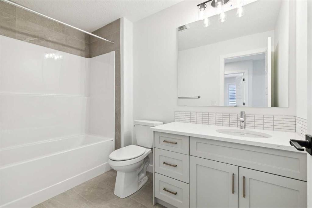 65 Sora Gardens Se, Calgary, AB - Indoor Photo Showing Bathroom