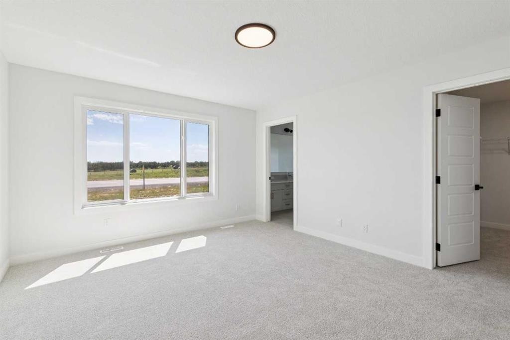 65 Sora Gardens Se, Calgary, AB - Indoor Photo Showing Other Room