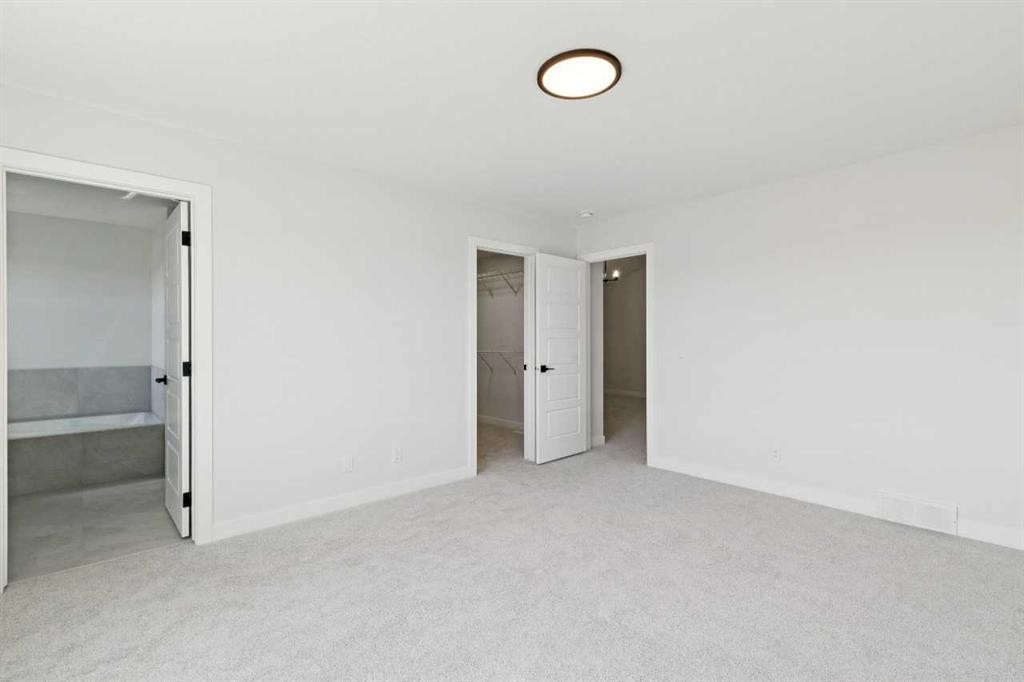 65 Sora Gardens Se, Calgary, AB - Indoor Photo Showing Other Room