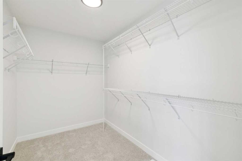 65 Sora Gardens Se, Calgary, AB - Indoor With Storage