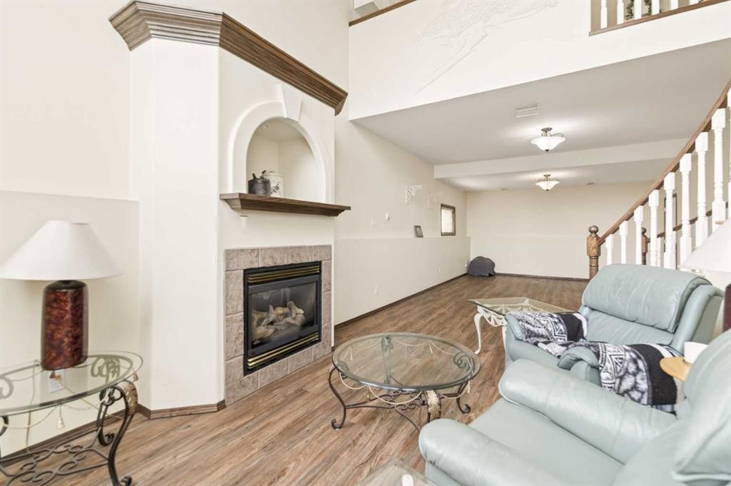25 Fern Glade Crescent, Sylvan Lake, AB - Indoor With Fireplace