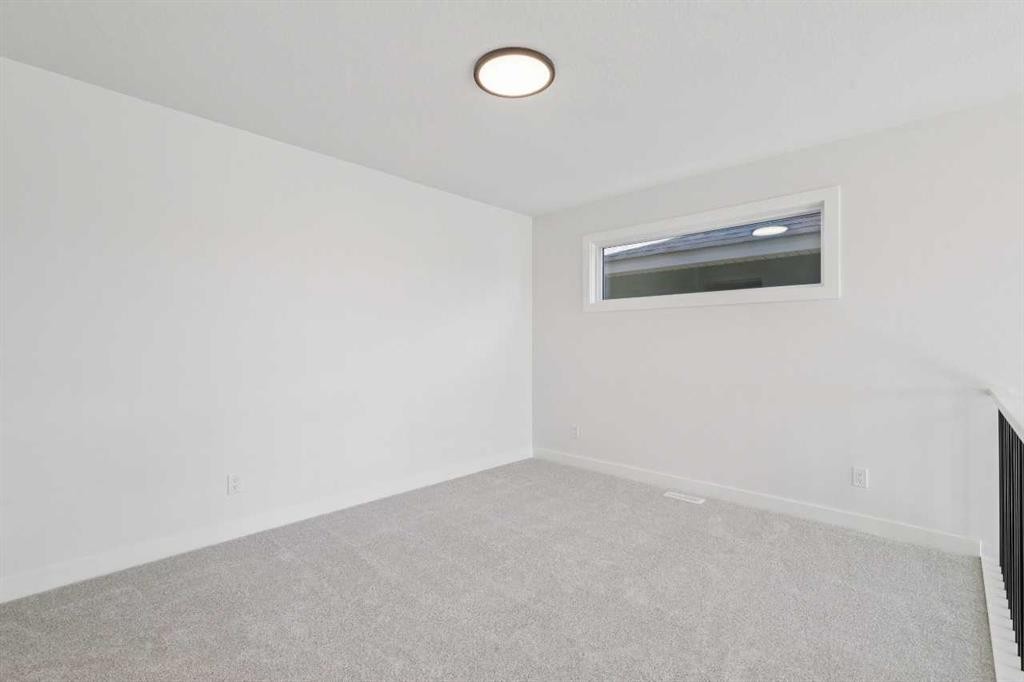 73 Sora Gate Se, Calgary, AB - Indoor Photo Showing Other Room