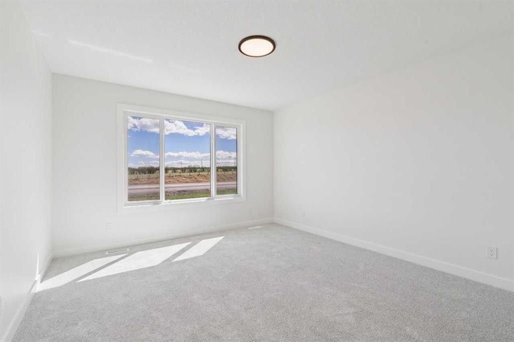 73 Sora Gate Se, Calgary, AB - Indoor Photo Showing Other Room