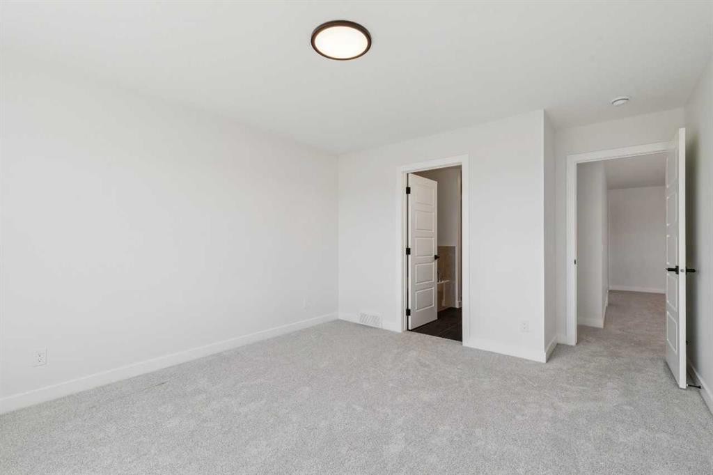 73 Sora Gate Se, Calgary, AB - Indoor Photo Showing Other Room