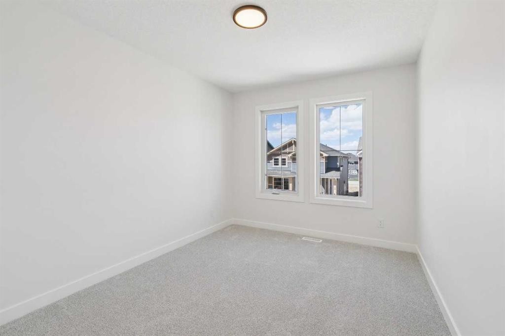 73 Sora Gate Se, Calgary, AB - Indoor Photo Showing Other Room