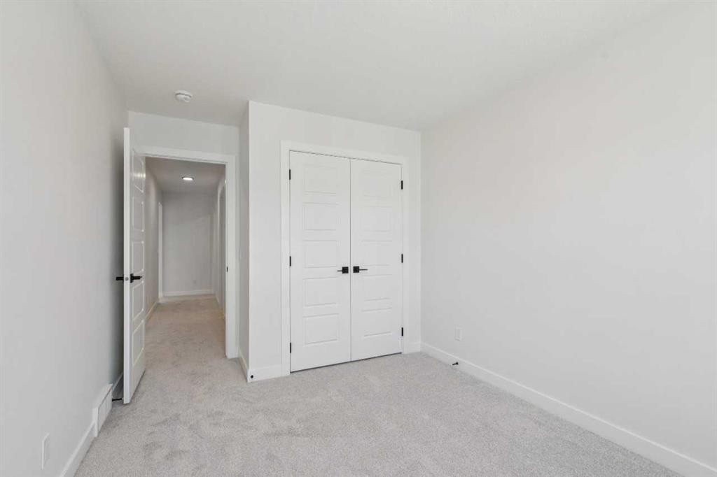 73 Sora Gate Se, Calgary, AB - Indoor Photo Showing Other Room