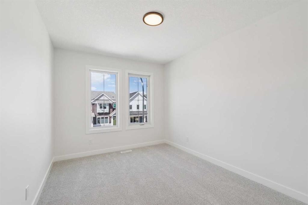 73 Sora Gate Se, Calgary, AB - Indoor Photo Showing Other Room