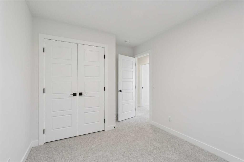 73 Sora Gate Se, Calgary, AB - Indoor Photo Showing Other Room
