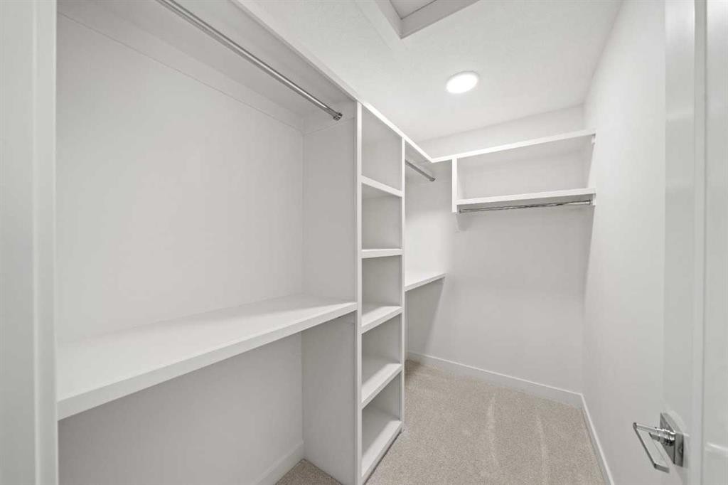83 Heritage Manor, Cochrane, AB - Indoor With Storage