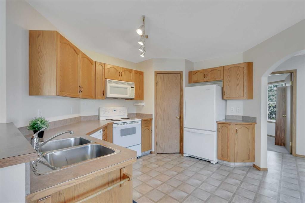 2 Janko Close, Red Deer, AB - Indoor Photo Showing Kitchen With Double Sink