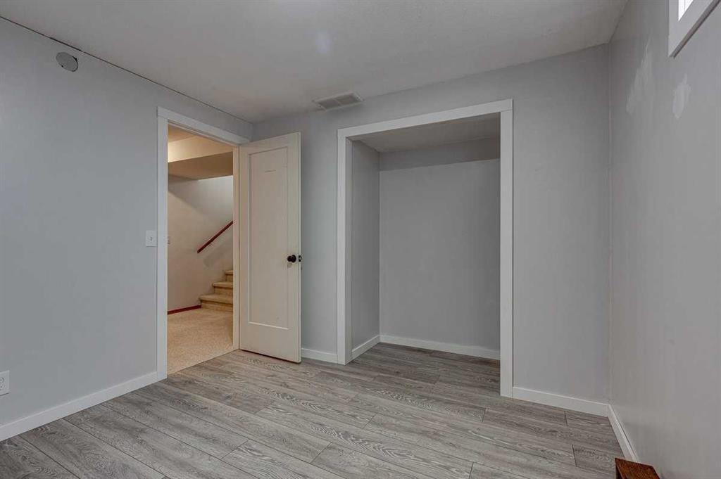 24 Bruns Bay, Lacombe, AB - Indoor Photo Showing Other Room