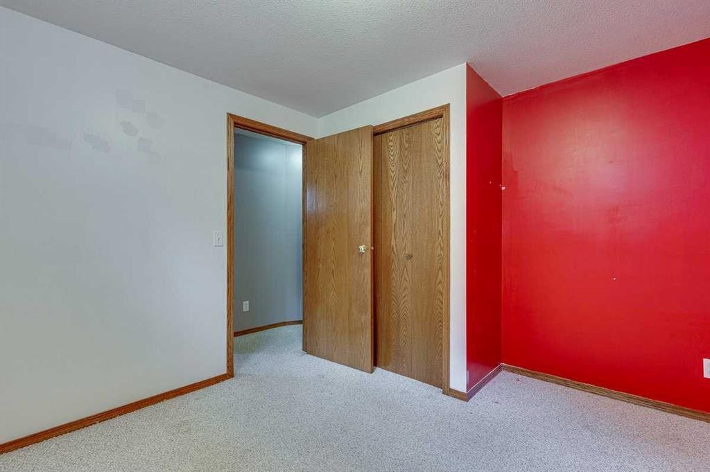 24 Bruns Bay, Lacombe, AB - Indoor Photo Showing Other Room