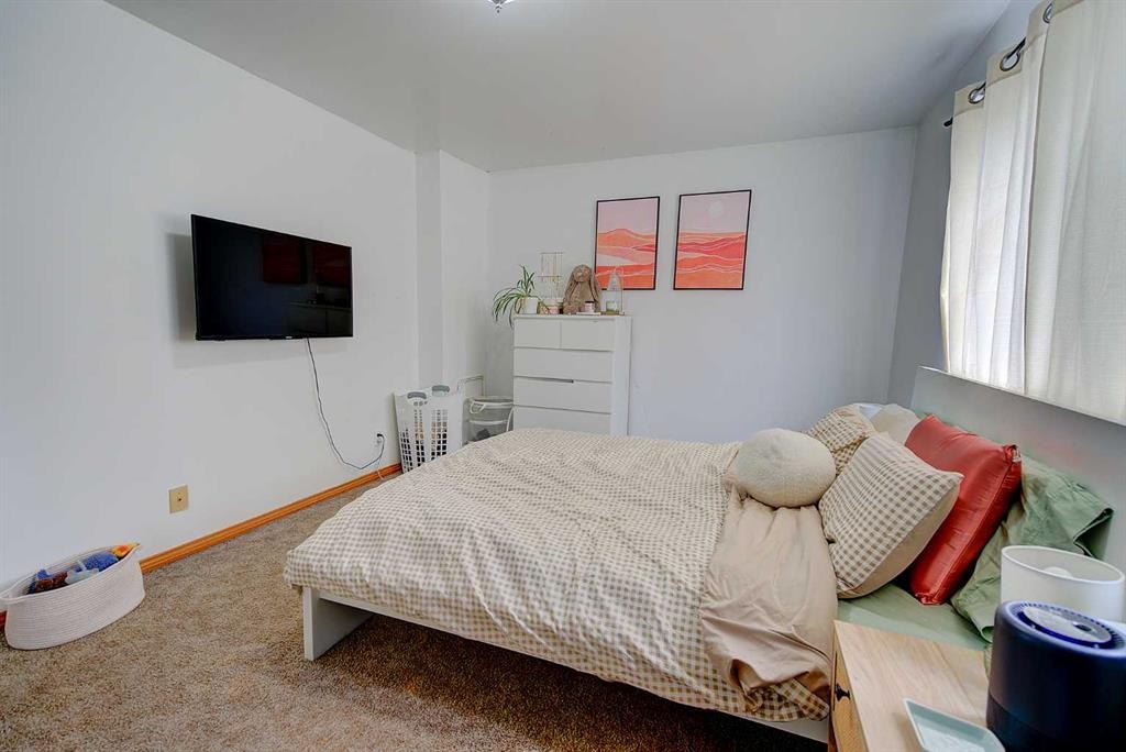 504-4719 33 Street, Red Deer, AB - Indoor Photo Showing Bedroom