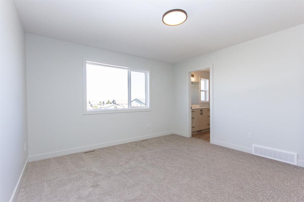 60 Trinity Street, Lacombe, AB - Indoor Photo Showing Other Room