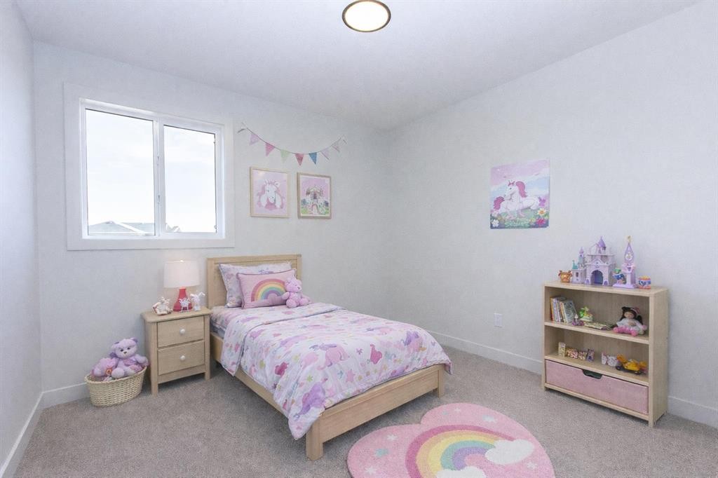 60 Trinity Street, Lacombe, AB - Indoor Photo Showing Bedroom