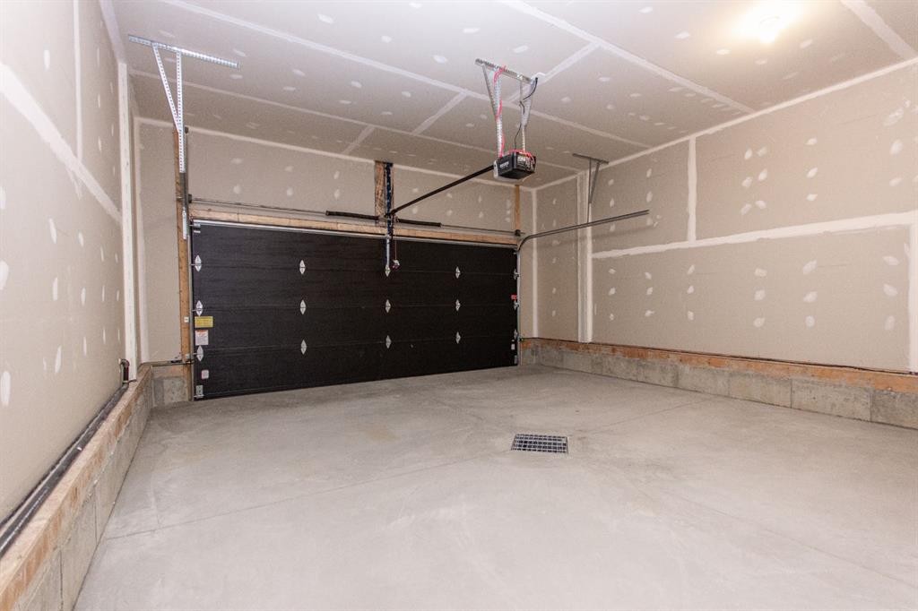 60 Trinity Street, Lacombe, AB - Indoor Photo Showing Garage