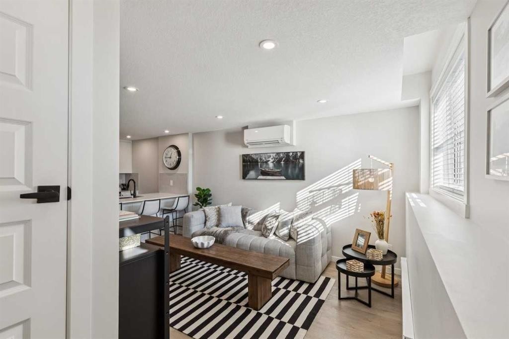 110-63 Belmont Passage Sw, Calgary, AB - Indoor Photo Showing Other Room