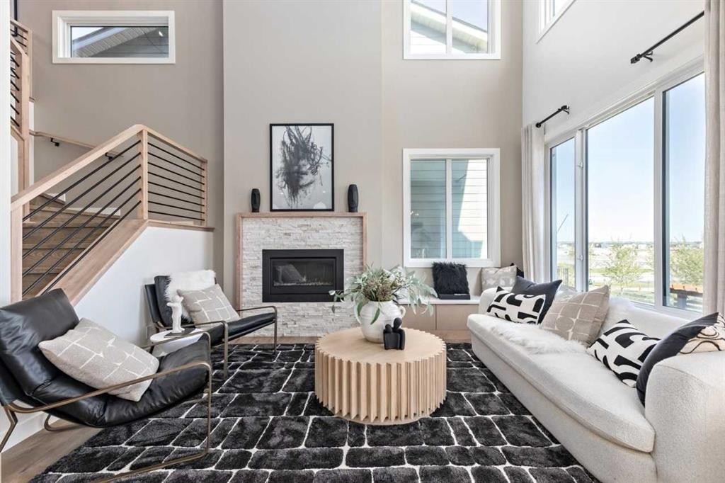 210 Sora Way Se, Calgary, AB - Indoor Photo Showing Living Room With Fireplace