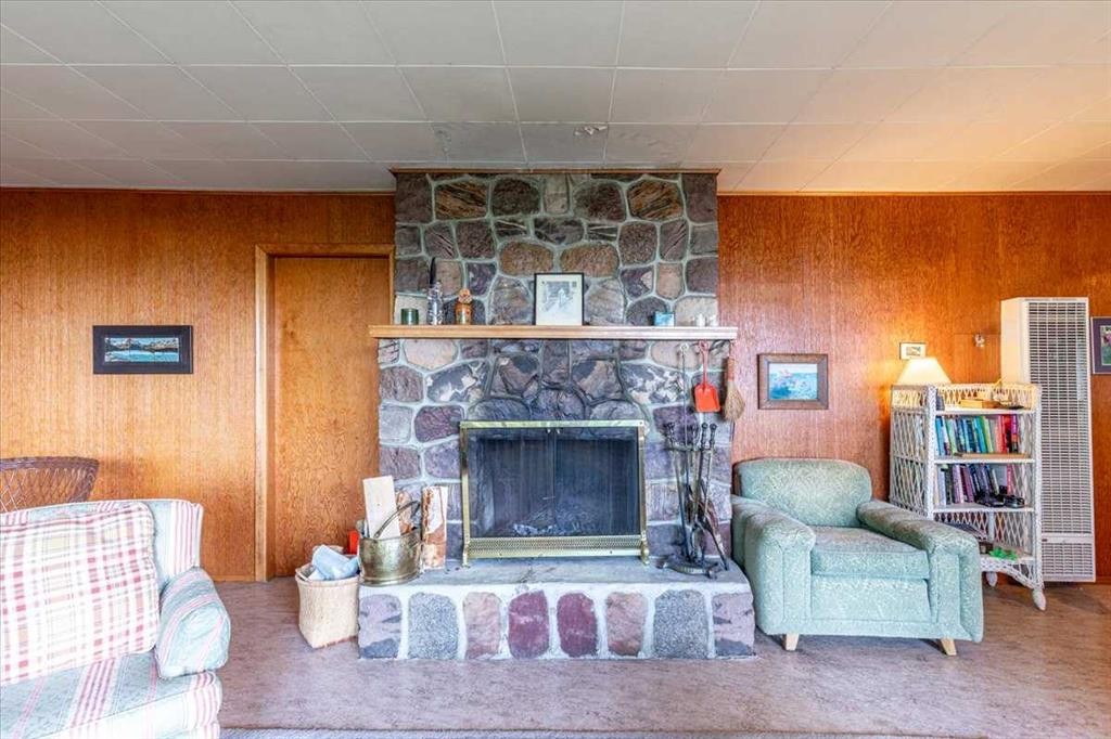 60 Beach Avenue, Itaska Beach, AB - Indoor Photo Showing Living Room With Fireplace