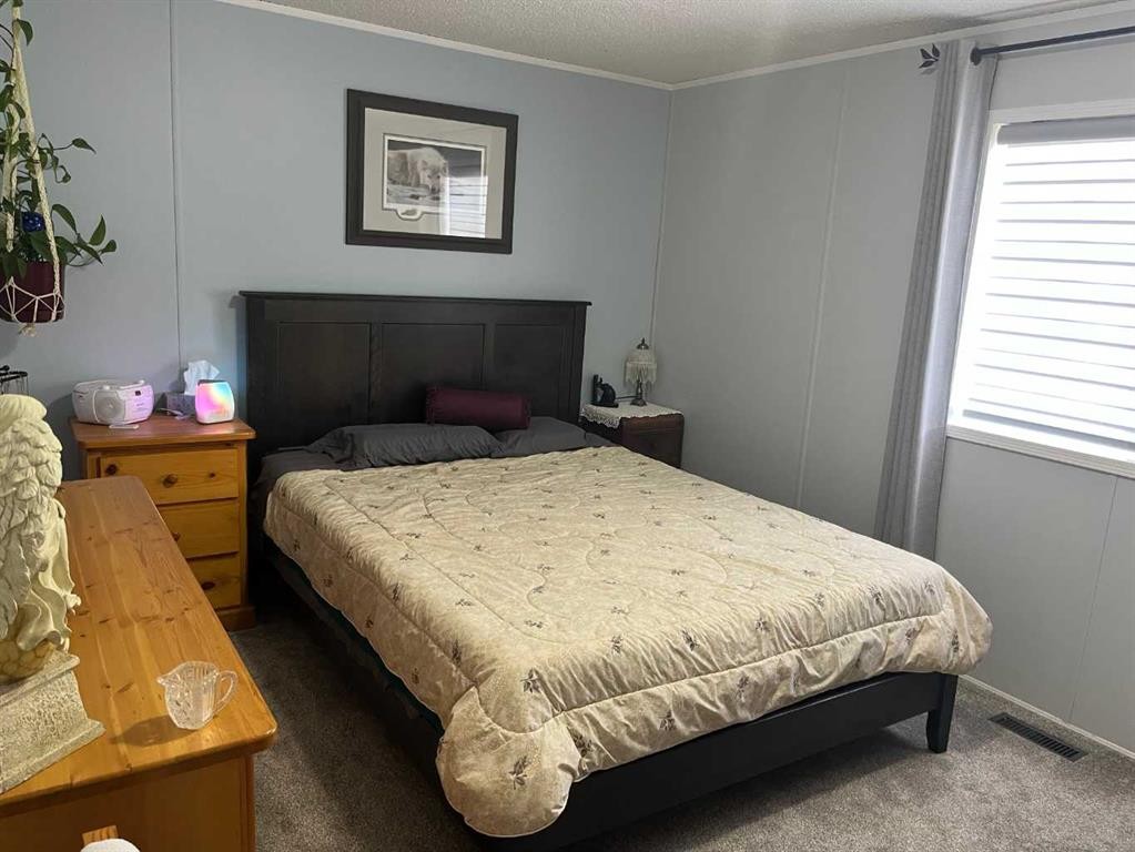 16 Main Street, Edberg, AB - Indoor Photo Showing Bedroom
