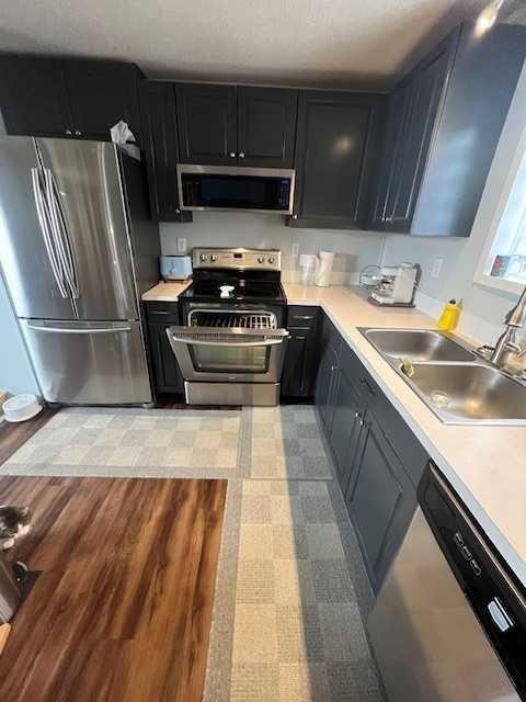 16 Main Street, Edberg, AB - Indoor Photo Showing Kitchen With Double Sink