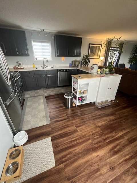 16 Main Street, Edberg, AB - Indoor Photo Showing Kitchen With Double Sink