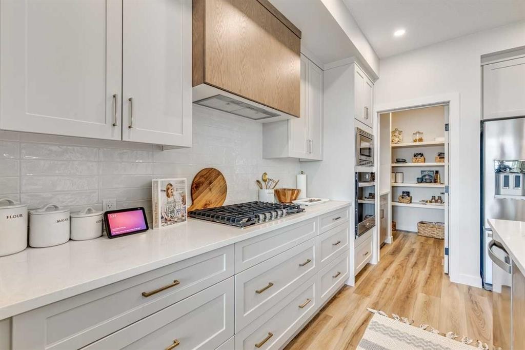 34 Amblefield Common Nw, Calgary, AB - Indoor Photo Showing Kitchen With Upgraded Kitchen